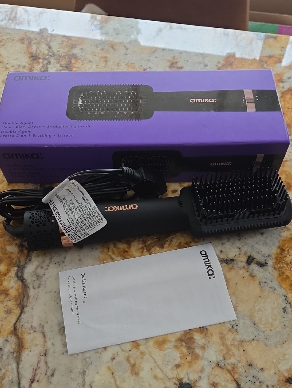 amika Black 2‑in‑1 Heated Straightening Brush with Rose Gold Logo